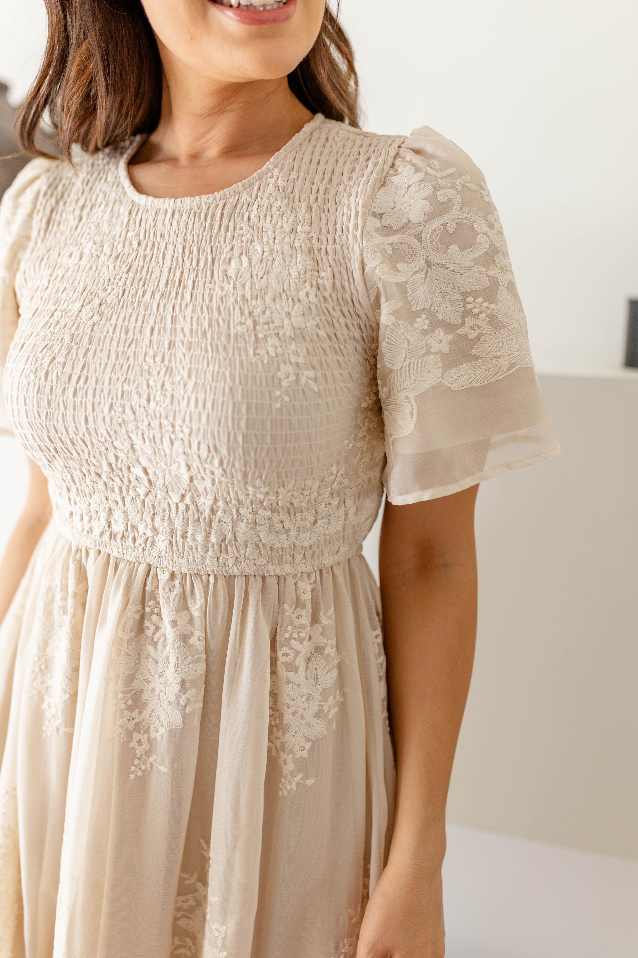 Aster' Smocked Bodice Embroidered Floral Midi Dress in Champagne