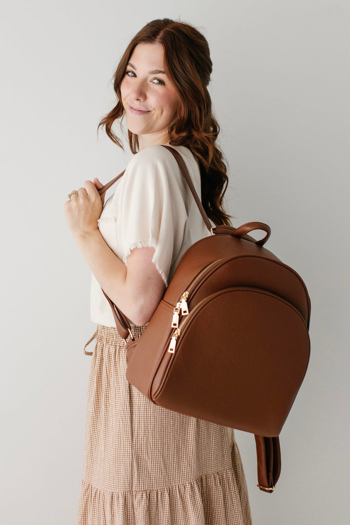 convertible backpack one strap leather Sofia Black 2-in-1 Tote Bag making it the perfect accessory for any occasion Nyra Webbing Strap Convertible Backpack