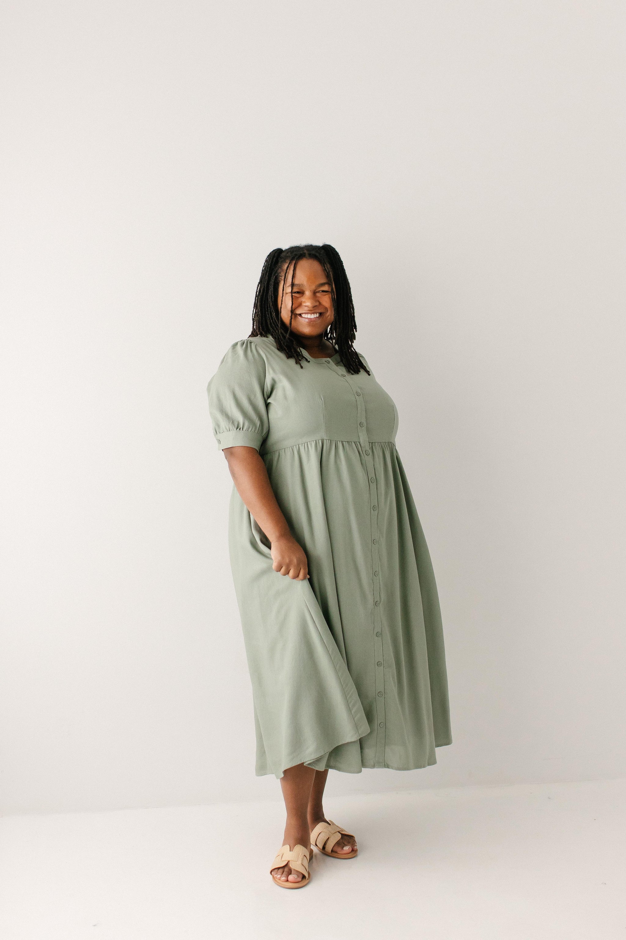 a line wedding dress with cathedral train The Remi Button Front Mini Dress